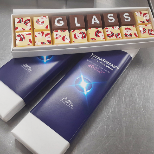 A box of logo branded chocolates for promotional giveaways.