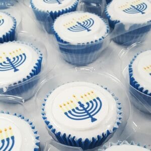 branded cupcake with white frosting